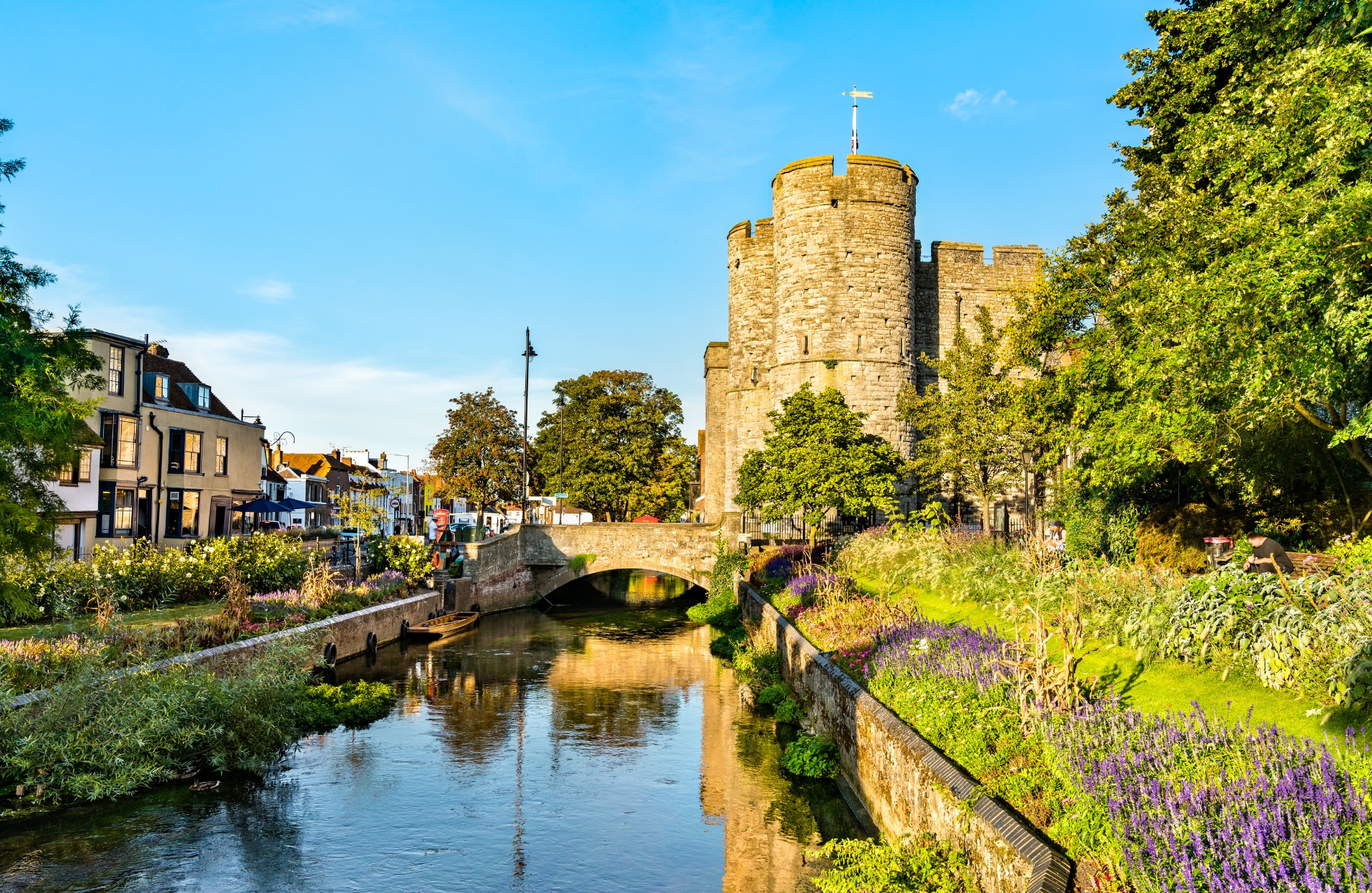 Scenic view of Wetgate Towers and gardens in Canterbury, Kent, showcasing the historic surroundings for Conveyancing Solicitors Canterbury clients.